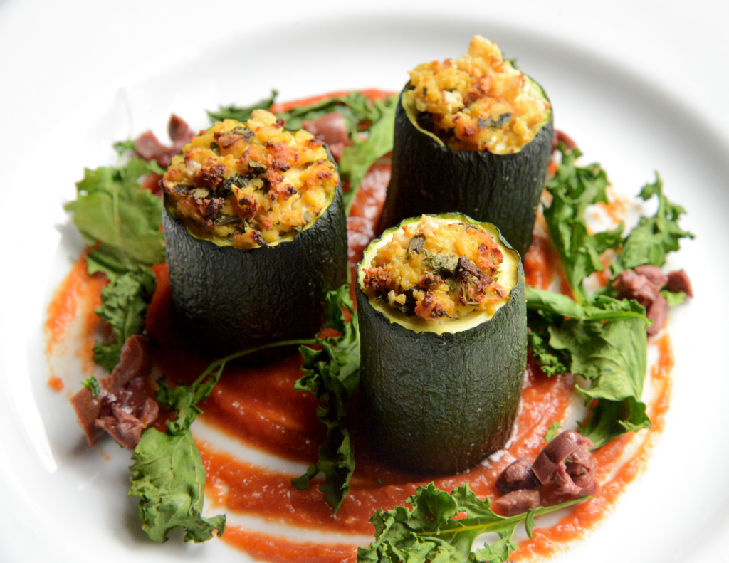 Zucchini Cannelloni with tomato & red pepper puree, crispy kale and black olive