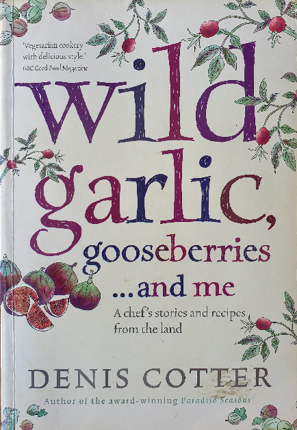 The image shows the cover of a cookbook titled "Wild Garlic, Gooseberries... and me." It is authored by Denis Cotter, noted as the author of the award-winning "Paradiso Seasons." The cover features illustrations of plants and gooseberries, suggesting a focus on natural and possibly foraged ingredients. A quote from BBC Good Food Magazine describes it as "Vegetarian cookery with delicious style," indicating that the recipes inside will be vegetarian and stylishly presented. The subtitle, "A chef's stories and recipes from the land," implies that the book includes personal anecdotes and recipes inspired by local and seasonal produce.
